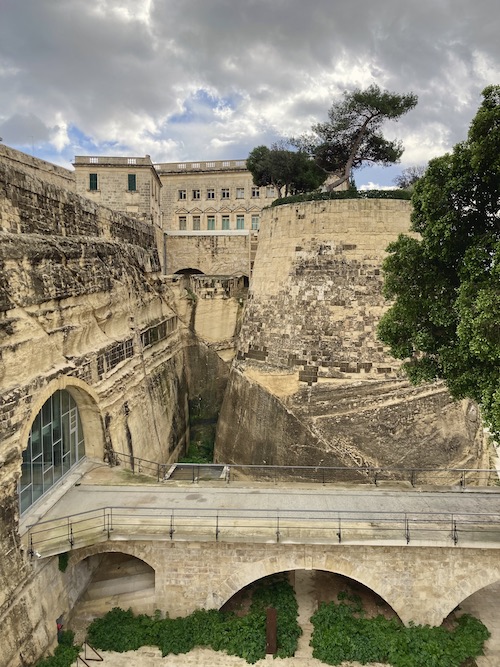 View from the bridge to the main city gate in Valletta Malta