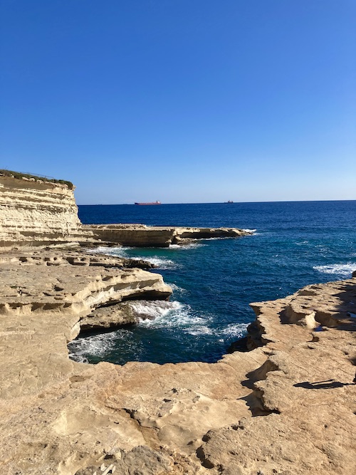 Limestone cove at St Peter's Pool in Marsaxlokk Malta