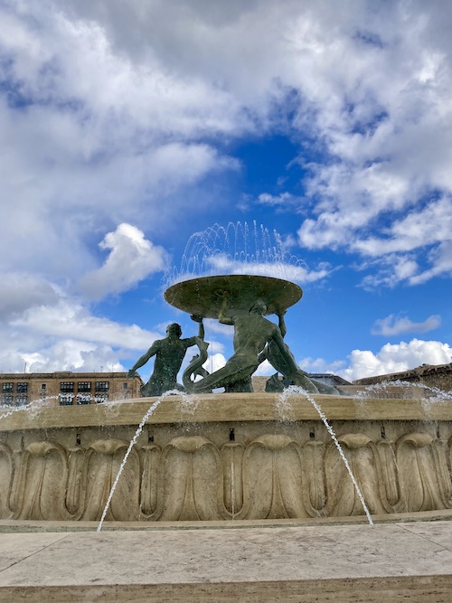 Triton fountain in the daytime in Valletta Malta